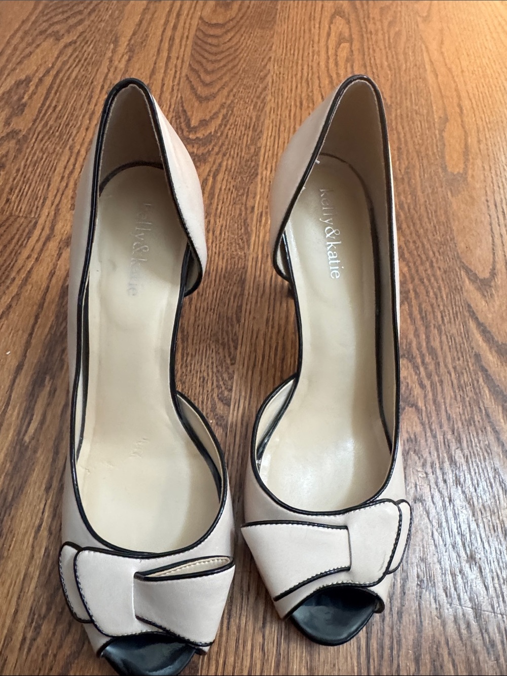Kelly & Katie Beige Pumps with Black Trim and Bow